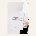 Teaching Appropriate Behaviours Social Stories Poster Set booklet cover, with an illustrated body-parts poster visible behind it